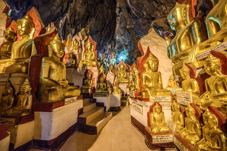 PINDAYA, MYANMAR - JANUARY 25, 2016 : Buddha statues inside the  Shwe Umin Pagoda Paya,  Myanmar (Burma).  Pindaya Caves  are a famous Buddhist pilgrimage site and a tourist attraction. HDR processed.のeditorial素材