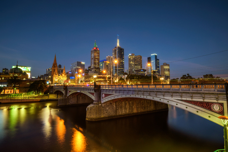City skyline of Melbourne downtown, Princess Bridge and Yarra River at night. Long exposure.の写真素材