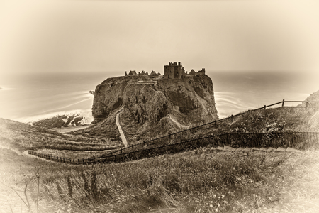Dunnottar Castle, Scotland, United Kingdom. Vintage black and white processed.のeditorial素材
