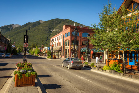 BANFF, ALBERTA, CANADA - JUNE 27, 2017 : Scenic street view of the Banff main shopping street in a sunny summer day. Banff is a resort town and popular tourist destination.のeditorial素材