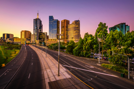 Summer sunset above skyscrapers of Melbourne downtown in Victoria, Australiaの写真素材