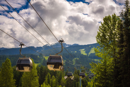 WHISTLER, BRITISH COLUMBIA, CANADA - JULY 2, 2017 : Cableway gondola in Whistler Village. Whistler is a canadian resort town visited by over 2 million people annually.のeditorial素材