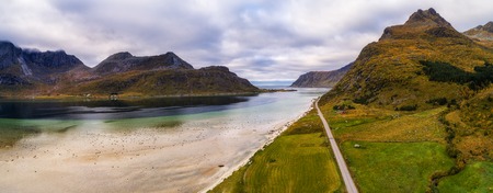Scenic road along the coastline and mountains on Lofoten islandsの写真素材