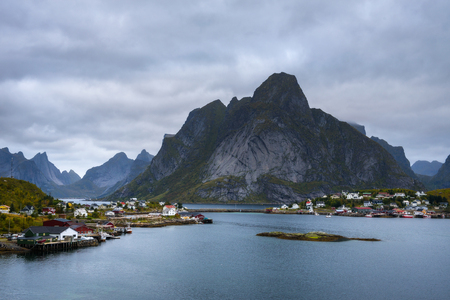 Mount Olstind and Reine fishing village on Lofoten islandsの写真素材