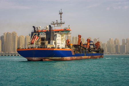 Oil tanker ship leaving the Dubai marinaの写真素材