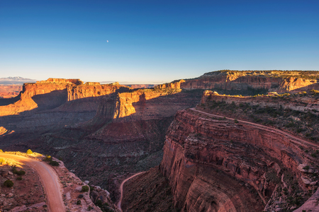 Shafer Canyon Overlook in Canyonlands National Park, Utah at sunsetの写真素材
