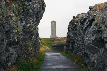Pathway leading towards Wicklow Head Lighthouse in Irelandの写真素材