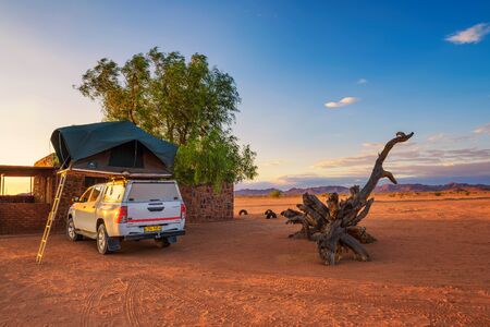 Tent located on the roof of a pickup 4x4 car in a desert camp, Namibiaのeditorial素材