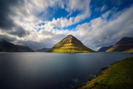 The island of Kunoy viewed from city of Klaksvik in the Faroe Islands, Denmarkの写真素材