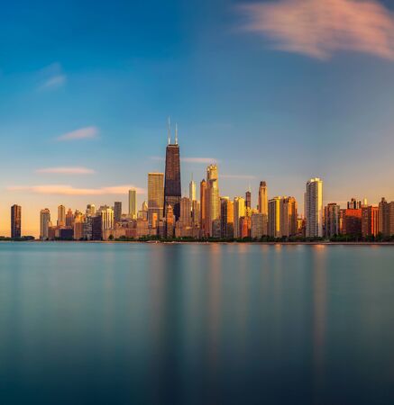 Chicago skyline at sunset viewed from North Avenue Beachの写真素材