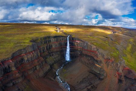 Aerial view of the Hengifoss waterfall in East Icelandの写真素材