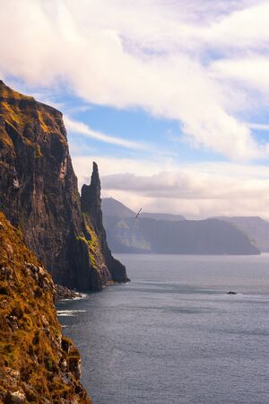 Trollkonufingur, also called The Witchs Finger on Faroe Islandsの写真素材