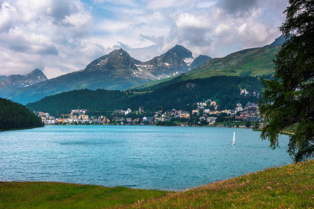 St. Moritz with lake called St. Moritzsee and Swiss Alps in Engadin, Switzerlandの写真素材