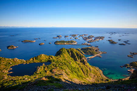 Village of Henningsvaer seen from mount Festvagtinden on Lofoten islands, Norwayの写真素材