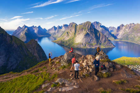 Hikers on top of Mt. Reinebringen, Lofoten islands, Norwayのeditorial素材
