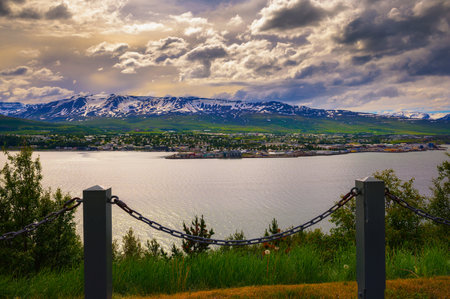 City of Akureyri with snowy mountains and fjord Eyjafjordur in northern Icelandの写真素材