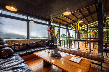 Interior of Celeste Mountain Lodge with views over rainforest in Costa Ricaのeditorial素材