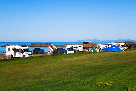Many tents and camping cars on Hovsvika beach in Lofoten islands, Norwayのeditorial素材
