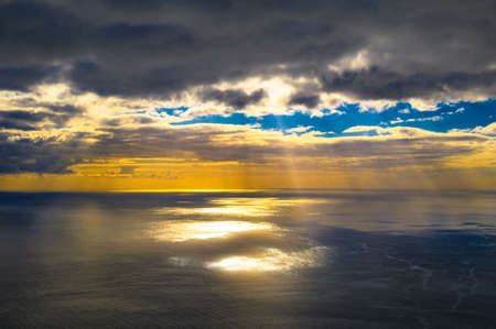 Aerial view of sunset over Atlantic Ocean seen from Madeira, Portugalの写真素材