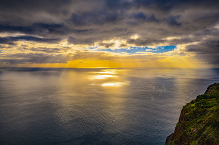 Aerial view of sunset over Atlantic Ocean seen from Madeira, Portugalの写真素材