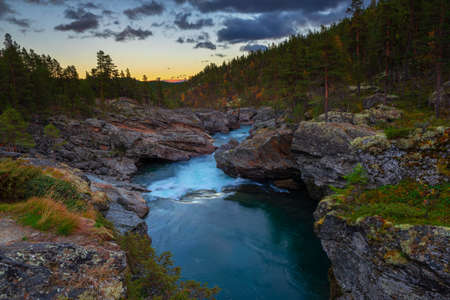 Sunset over Ridderspranget in Jotunheimen National Park, Norwayの写真素材