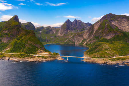 Aerial view of Djupfjorden fjord surrounded by high mountains in Lofoten, Norwayの写真素材
