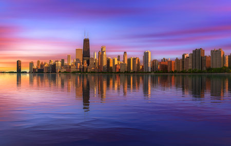 Colorful sunset above Chicago skyline across Lake Michiganの写真素材
