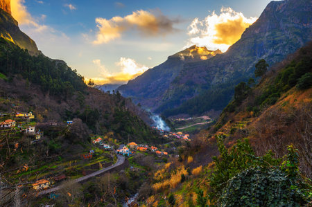 Sunset above Curral Das Freiras village on Madeira Island, Portugalの写真素材