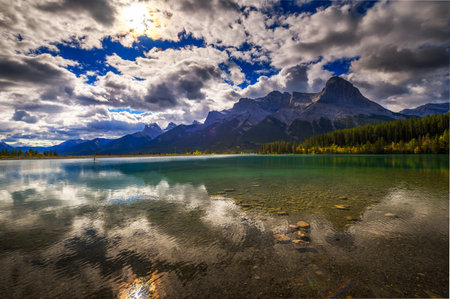 Rundle Forebay Reservoir with Rocky Mountains in Canmore, Canadaの写真素材