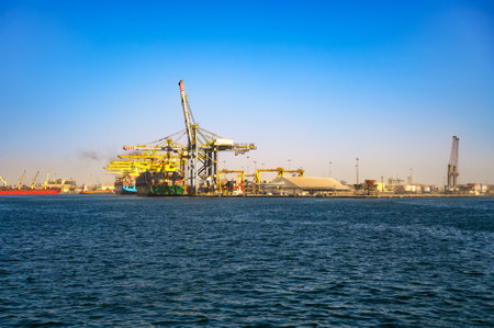 Port of Dakar in Senegal with big cargo ships, cranes and heavy cargo containersの素材 [FY310214023251]