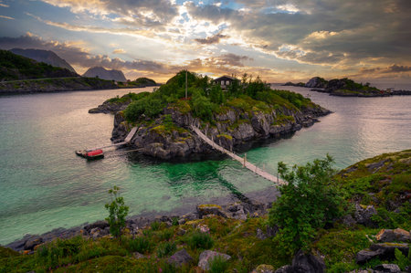 Scenic sunset over Sandvikholmen Island, near Hamn i Senja, Norwayの写真素材