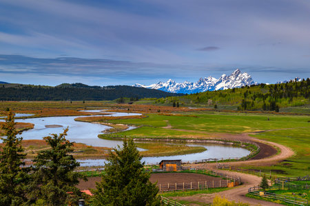 Snowy Grand Teton Mountains and Buffalo Fork of the Snake Riverの写真素材