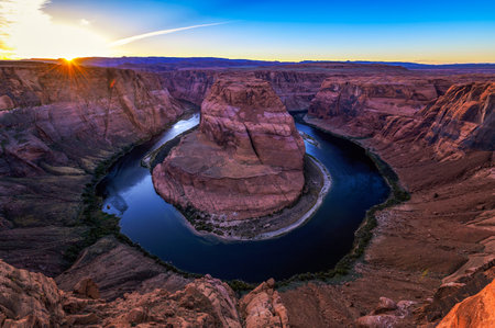 Sunset over Horseshoe Bend and Colorado riverの写真素材