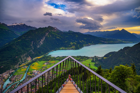 Sunset view from Harder Kulm overlooking Interlaken and Thunersee in Switzerlandの写真素材