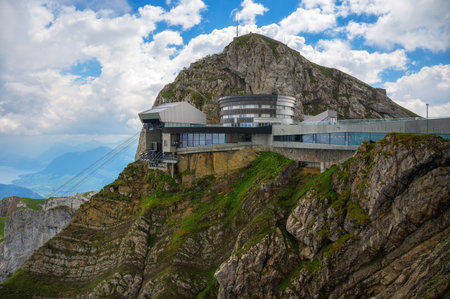 Mount Pilatus in Switzerland with a cable car station and a mountain resortの写真素材
