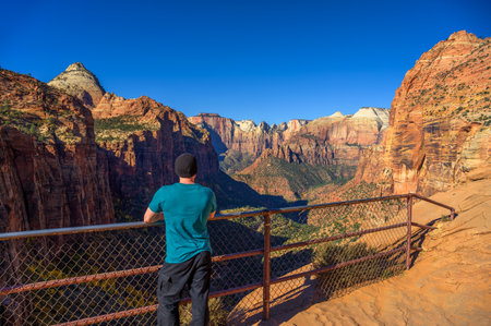 Tourist at Canyon Overlook in Zion National Park, Utahの写真素材