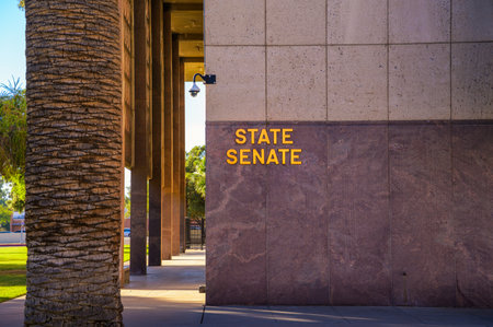 Exterior view of the Arizona State Senate building with signage in Phoenix.