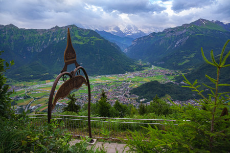 Scenic view from Harder Kulm at 1322m, overlooking Interlaken and the surrounding Swiss Alps in Switzerland.の写真素材