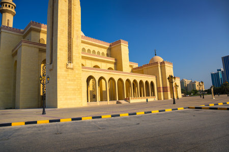 Al Fateh Grand Mosque in Manama, Bahrain under clear blue sky. The Al Fateh Grand Mosque is the largest mosque in Bahrain, showcasing exquisite Islamic architecture.の写真素材