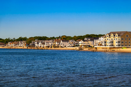 Coastal view of residential homes and beachfront buildings along Walnut Beach in Milford, Connecticut, USAの写真素材