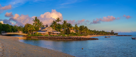 Bel Ombre, Mauritius - February 24, 2025 : Panoramic view of beachfront Restaurant at Heritage Le Telfair Resort in Bel Ombre, Mauritius, a 5-star luxury resort with a serene spa and a golf course.のeditorial素材