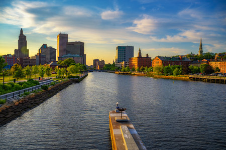 Sunset view of downtown Providence and the Providence River in Rhode Island, USA, with city...