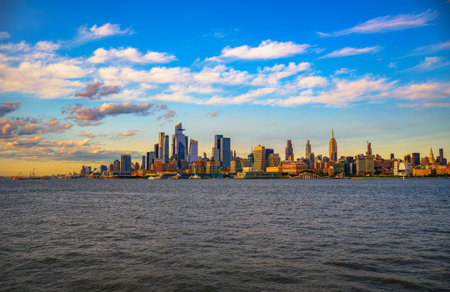 New York City Skyline with Hudson Yards District at Sunset, seen across the Hudson River.