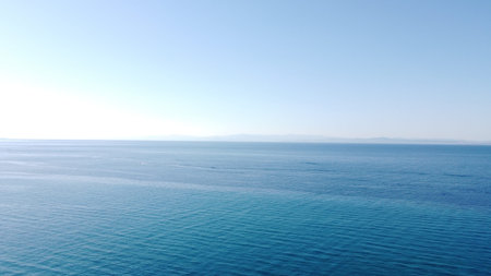 Seascape with blue sea and blue sky. View from above.