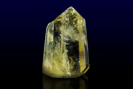 Piece of citrine on the surface of solid rockの写真素材