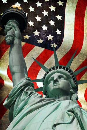 Statue of Liberty on Island in New York with flagの写真素材