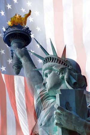 Statue of Liberty on Island in New York with flagの写真素材