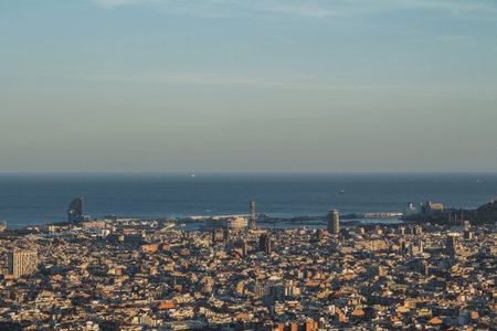 This is the spectacular view of Barcelona in Spain. It is a sunny day and it is possible to distinguish many monuments.の写真素材