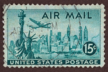 Postage Stamp New York Air Mail stamp. Airmail stamp from 1947 featuring the New York skyline and Statue of Libertyのeditorial素材