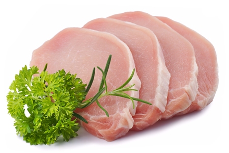 Meat pork parsley rosemary pork loin slices on a white backgroundの写真素材